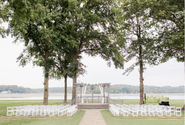 The Ospreys at Belmont's outdoor ceremony setting, welcoming guests to a premier wedding experience in Virginia.