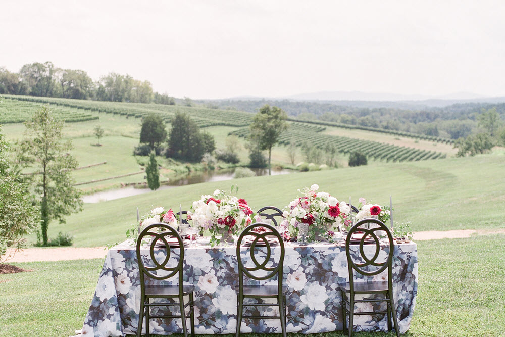Elegant outdoor wedding setup at Stone Tower with panoramic views of Northern Virginia's landscape.
