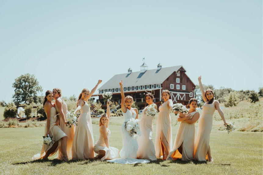 Bride and Bridesmaids Sharing a Joyful Moment at Zion Springs Barn Wedding