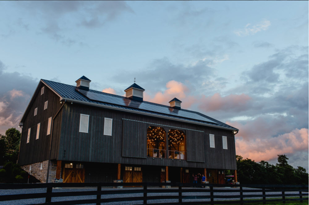 Elegant barn wedding venue at 6 Pastures Farm with panoramic views of Virginia's landscape.