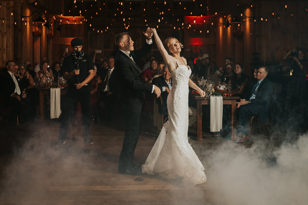 Newlyweds dancing at their reception at Zion Springs a rustic elegant barn wedding venue in Northern Virginia.