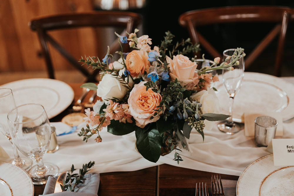 Beautiful floral wedding centerpieces at Zion Springs, an elegant, rustic barn wedding venue in Hamilton, Northern Virginia.