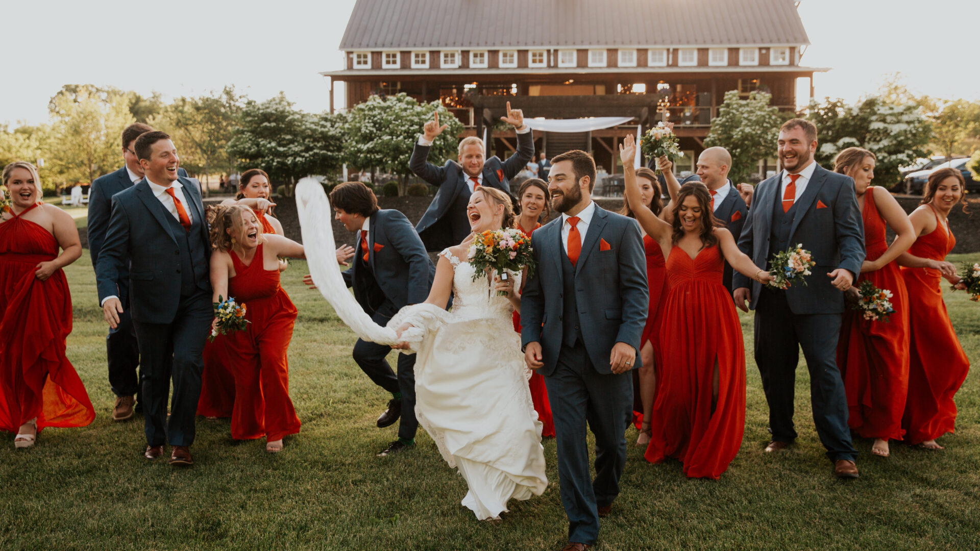 Newlyweds sharing a fun photo op at the barn at Zion Springs, an all-inclusive wedding venue in Northern Virginia.